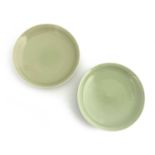 Two Chinese celadon glazed dishes, circular form, 14.5cm diameter (2)