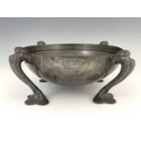 Oliver Baker for Liberty & Co, a Tudric pewter bowl, circa 1902, circular form, raised on four