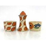 Clarice Cliff for Newport Pottery, an Umbrellas and Rain salt, printed marks, 8cm high, together