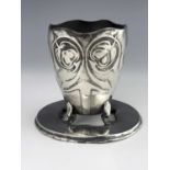 Archibald Knox for Liberty and Co., a Tudric Arts and Crafts pewter vase, model 0512, the beaker