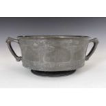 David Veasey for Liberty and Co., an Arts and Crafts Tudric pewter twin handled bowl, model 011,