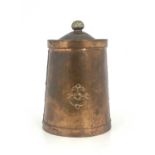 An Arts and Crafts copper tea canister, circa 1905, tapered cylindrical form, domed top with