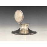 A George V silver capstan inkwell, the base decorated with a reeded border, the hinged cover