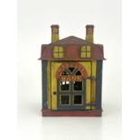 A cast iron Novelty Money Bank, late 19th Century, in the form of an American provincial bank with