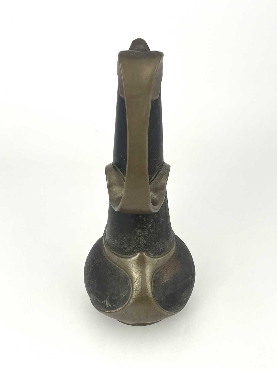A Bretby Arts and Crafts metallic strap jug, globe and cone form with tendril strap handle, in the - Image 4 of 7