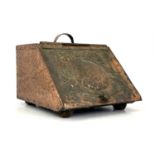 John Pearson (attributed) an Arts and Crafts copper clad coal scuttle, the hinged lid repousse