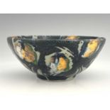 Clive Davies (British, 1939), a stoneware bowl decorated with wax resist and various coloured