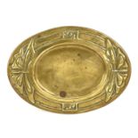 Margaret Gilmour, a Glasgow School, Arts and Crafts brass card tray, circa 1905, oval form, repousse