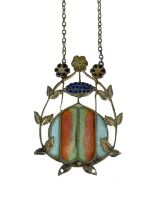 A plique-a-jour enamelled pendant with openwork foliate frame with flower head surmount, 4cm high No