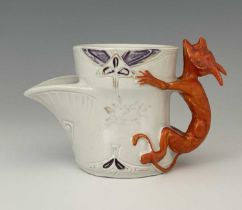 A Continental porcelain shaving mug, traditional spouted form with reticulated dish, the handle