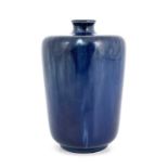 Ruskin Pottery, a Souffle glazed vase, 1905, shouldered cylindrical form, blue streaky glaze,
