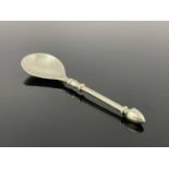 Guild of Handicraft, an Arts and Crafts silver spoon, London 1931, the pear shaped bowl on a knopped