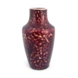 Ruskin Pottery, a High Fired vase, 1920, shouldered form, marbled sang de boeuf, impresssed marks,