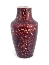 Ruskin Pottery, a High Fired vase, 1920, shouldered form, marbled sang de boeuf, impresssed marks,