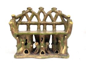 An Art Pottery garden or conservatory double bench, late 19th Century, of naturalistic rustic design