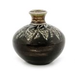 Martin Brothers, a small stoneware vase, 1885, squat ovoid form, sgraffito decorated with foliate