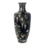 A large Japanese cloisonne enamelled vase, shouldered form, decorated with a watery landscape of