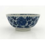 A Chinese blue and white bowl, Qing Dynasty, the outer frieze painted with a continuous border of