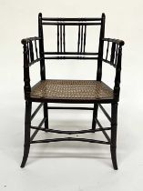 An Aesthetic Movement armchair, circa 1880, simulated bamboo frame, cane seat