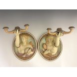 A pair of Minton relief moulded wall sconces, circa 1860s, modelled a allegorical figures of Truth