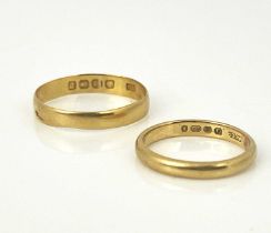 Two 22 carat gold wedding bands, size M and U1/2, 5.41g (2)