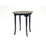 Josef Hoffmann (attributed), a Secessionist bentwood and plywood table, the circular top on four