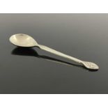 Bernad Cuzner for Liberty and Co., an Arts and Crafts silver teaspoon, Birmingham 1913, the pear