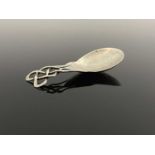 Keswick School Industrial Arts, an Arts and Crafts silver caddy spoon, Chester 1915, planished