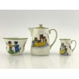 Louis Wain for Paragon China, a milk jug and cover, 'A Fine Catch', a cream jug 'A Fine Catch',