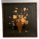 A Rowley Gallery Arts & Crafts marquetry wall plaque, various woods to form a vase of flowers,