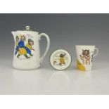 Louis Wain for Paragon China, a hotwater jug and cover with titled three cat scenes, 16.5cm high,