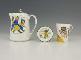 Louis Wain for Paragon China, a hotwater jug and cover with titled three cat scenes, 16.5cm high,