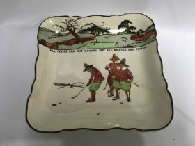 A Royal Doulton series ware dish decorated with transfer printed illustrations in the style of