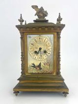 A French gilt metal bracket clock, circa 1880, the architectural case with lovebird finial atop a