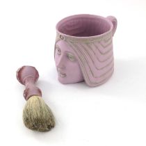 A Schafer & Vater bisque porcelain portrait shaving mug and brush, Egyptian Queen, lilac glazed with
