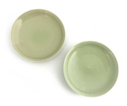 Two Chinese celadon glazed dishes, circular form, 14.5cm diameter (2)