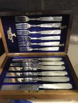 A group of plated wares to include a cased set of carved mother of pearl handled fruit knives and