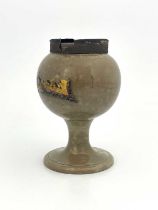 A 19th Century apothecary jar, remnants of gilt contents label, the spout with moulded bacchus mask,