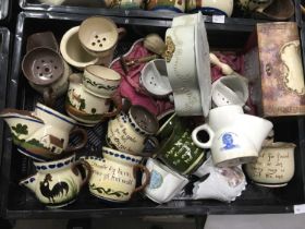 A collection of 19th and 20th century shaving mugs, including Torquay pottery and cased examples (