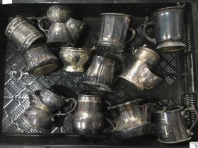 A collection of electroplated shaving mugs including American examples (12)