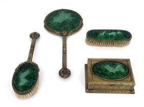 Heinrich Hoffmann, a Czech glass and gilt metal dressing table set, each with relief moulded