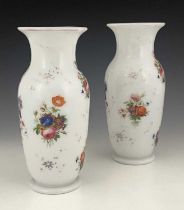 A pair of Baccarat enamelled opaque glass vases, circa 1860, shouldered form painted with bunches of