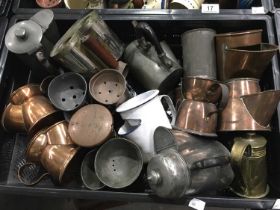 A collection of pewter and copper shaving mugs, including scuttle form examples, Dixon & Sons pewter