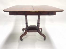 A Regency mahogany tea table, circa 1820, satinwood crossbanded fold-over top, single frieze drawer,