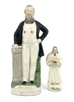 Two Staffordshire figures, modelled as Evangelical preachers Moody and Wesley, 31cm high (2)