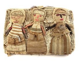 A Peruvian Chancay triple group of textile burial dolls, each as female figures with expressive