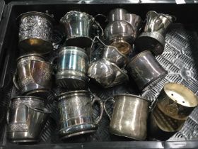 A collection of silver plate shaving mugs, maker's including The Meriden Silver Plate Co; James W