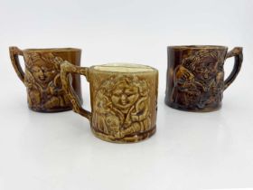 In the style of E & W Bennett Baltimore, three Rockingham Ware shaving mugs, mid 19th century,