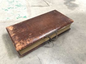 A Victorian cushioned leather bound photograph album with contemporary photographs, including Prince
