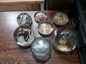 A collection of Pinchbeck, Sulphide and etched glass paperweights, 19th century and later, including